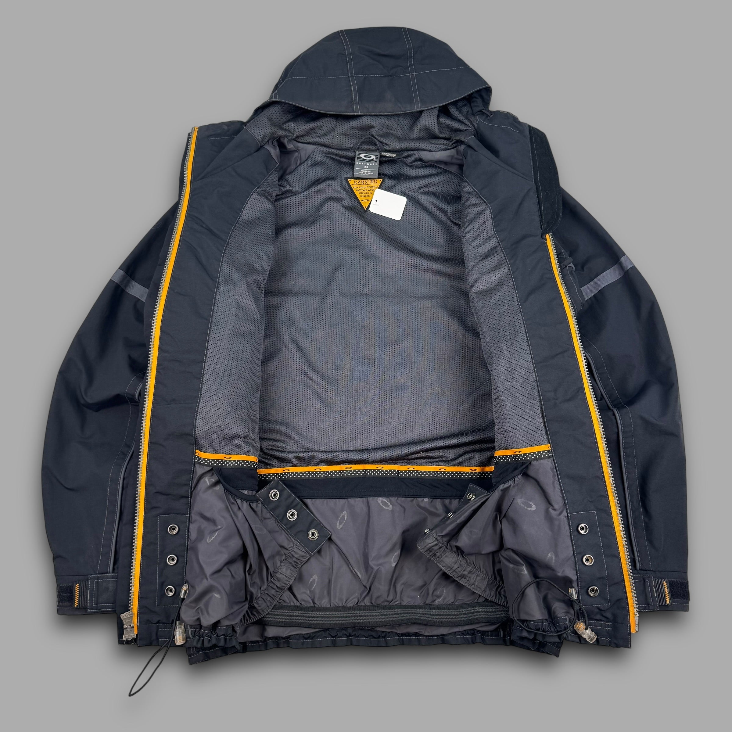 Oakley software 2000's technical panelled multi pocket softshell ski jacket (S-M)