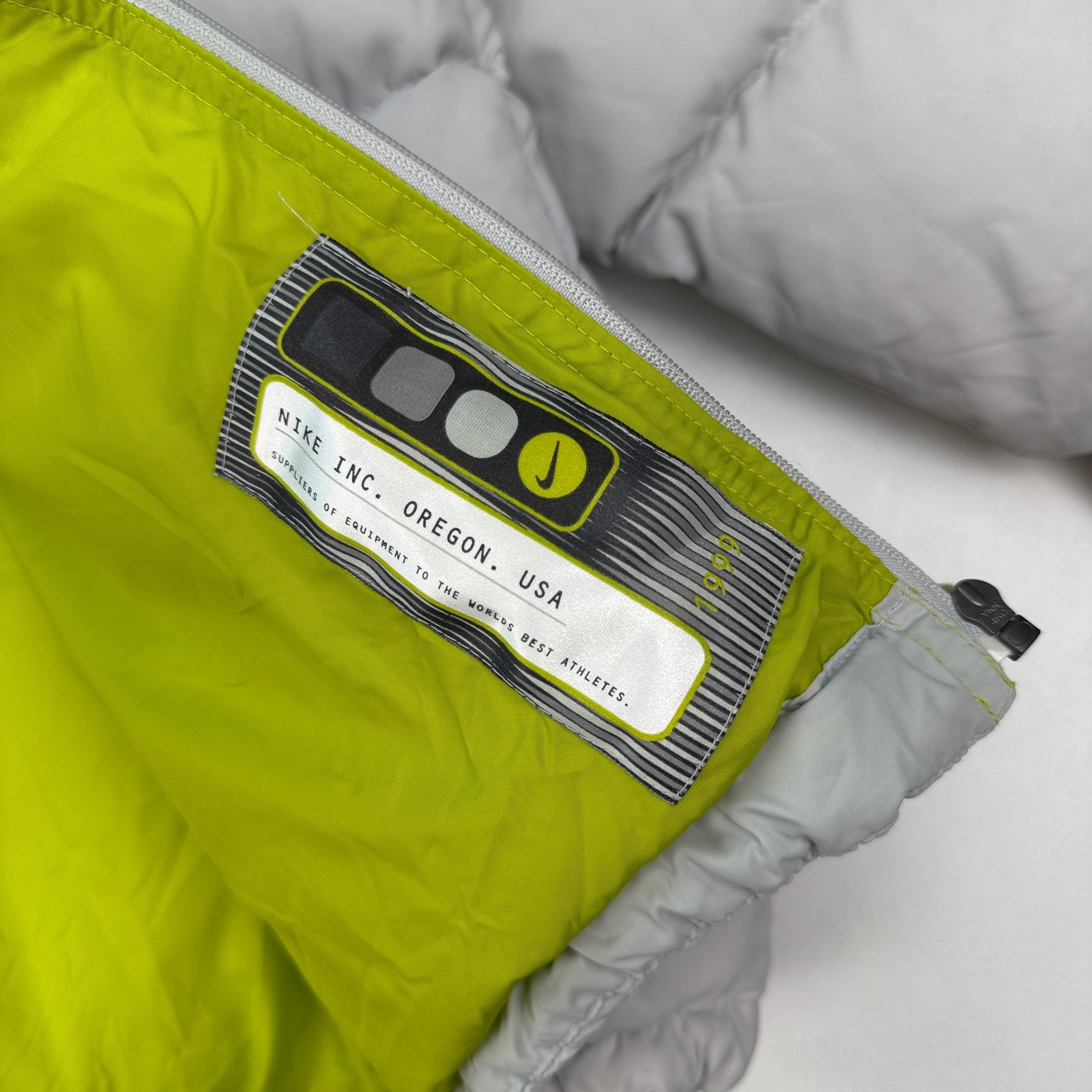 Nike 1990's technical mini swoosh multi pocket downfilled puffer jacket (M)