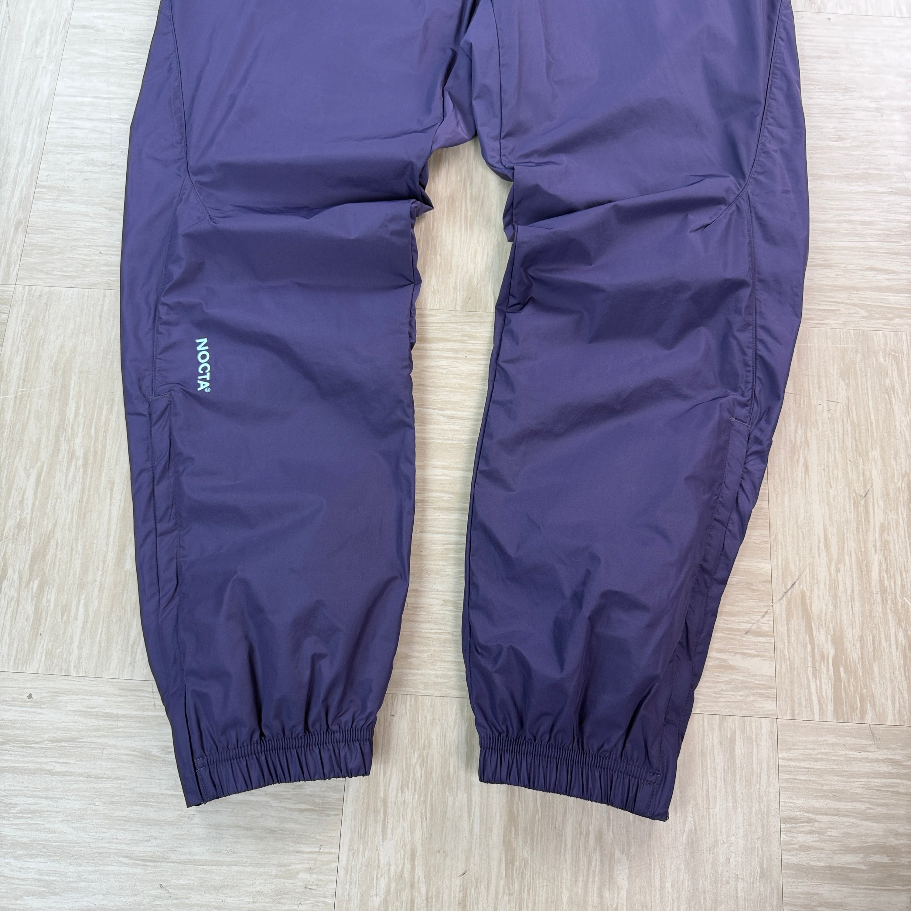 Nike x nocta North Star nylon track bottoms (M)