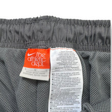 Load image into Gallery viewer, Nike 2000’s baggy cuffed track bottoms (L)
