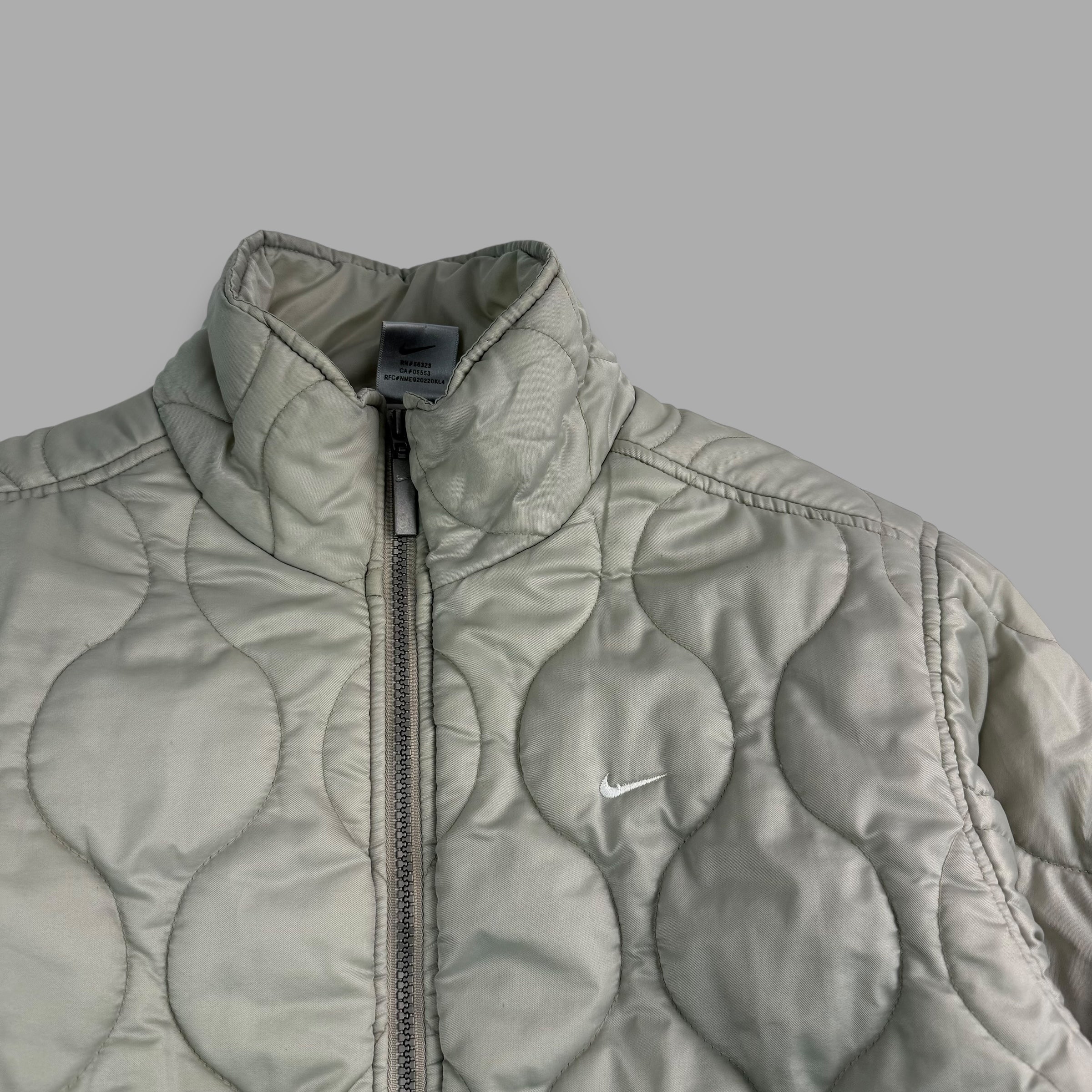 Nike 2000's mini swoosh patterned puffer jacket (S)