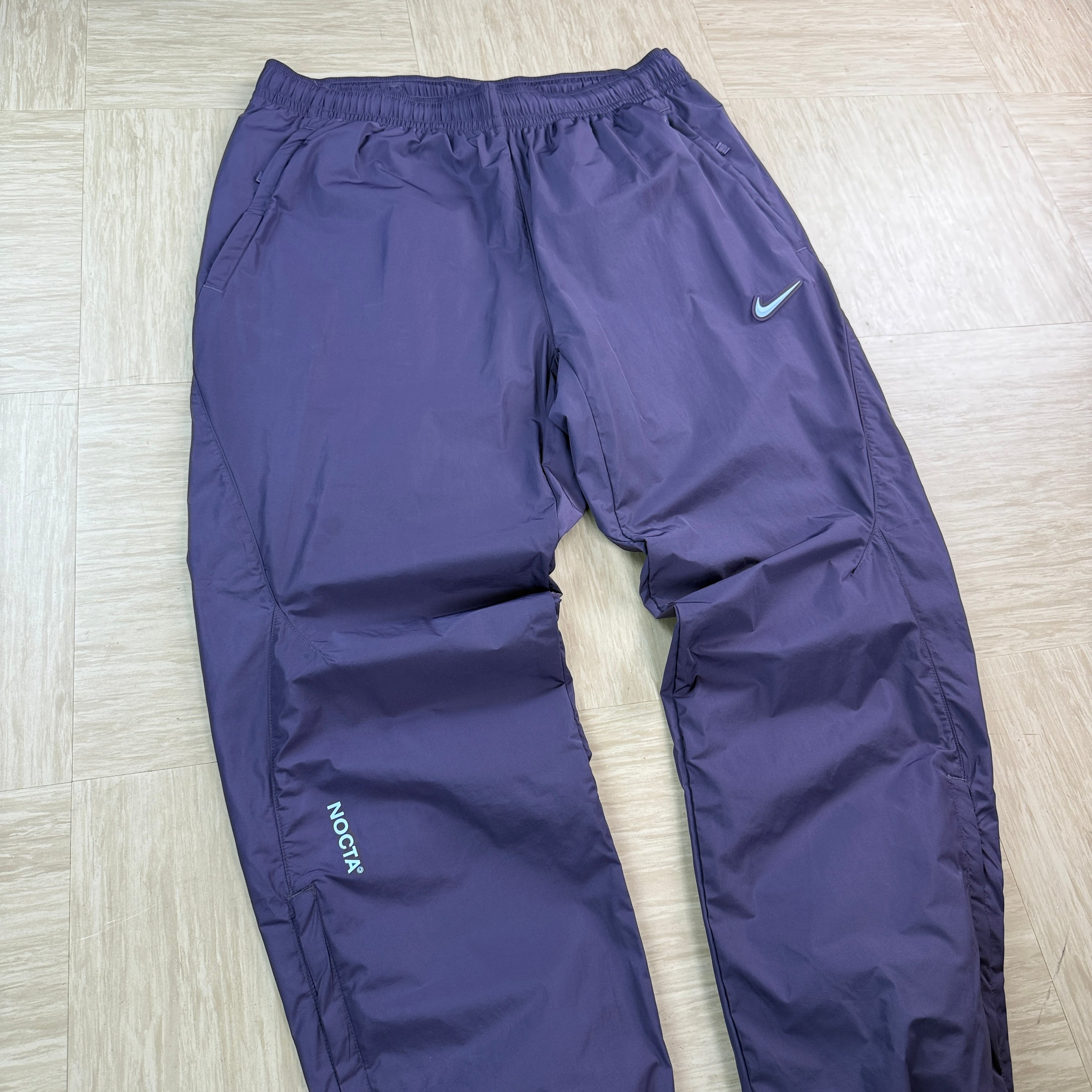 Nike x nocta North Star nylon track bottoms (M)