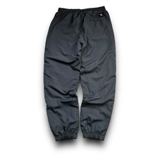 Load image into Gallery viewer, Nike 2000’s baggy cuffed track bottoms (L)
