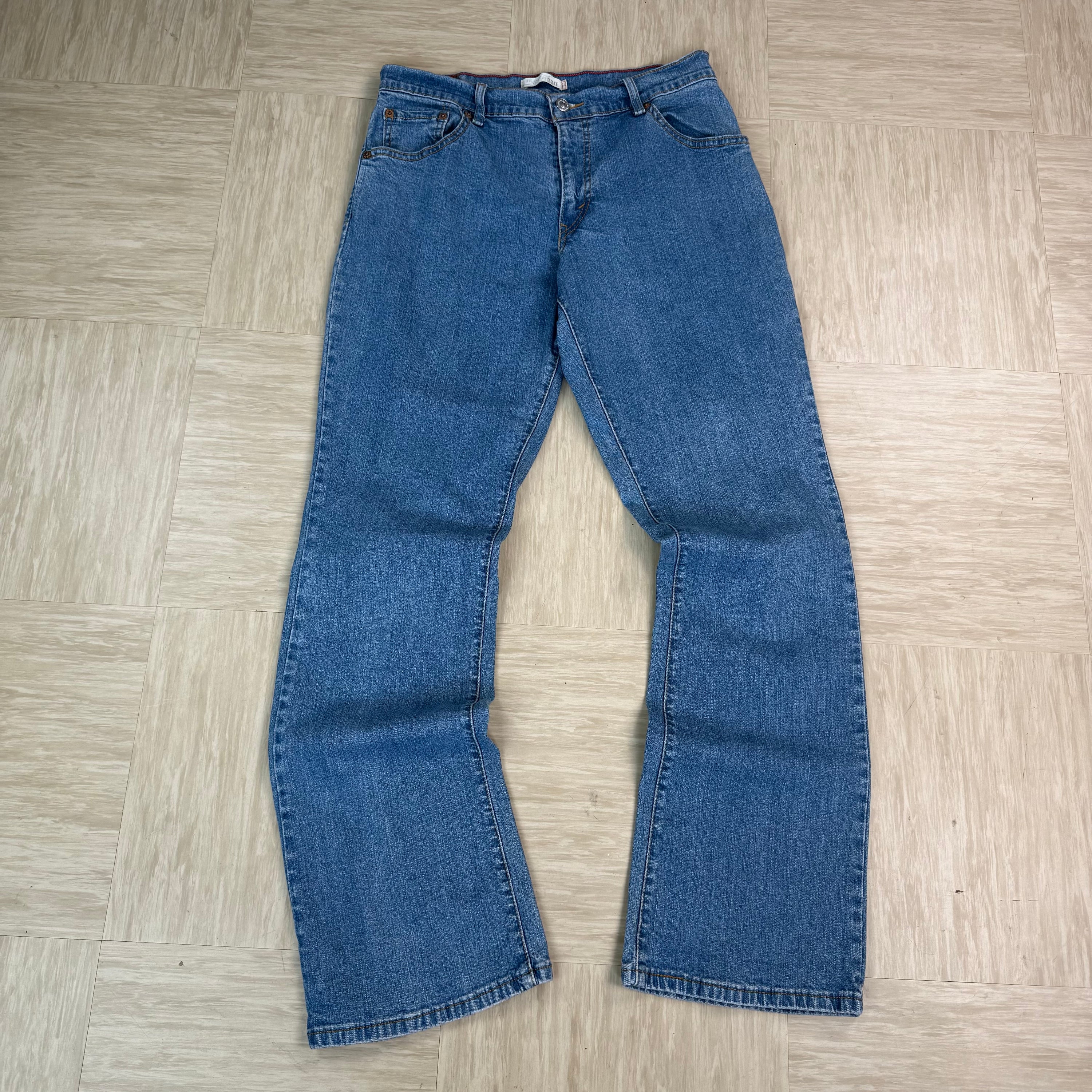 Levi's 550 2000's relaxed bootcut light washed denim jeans (S)