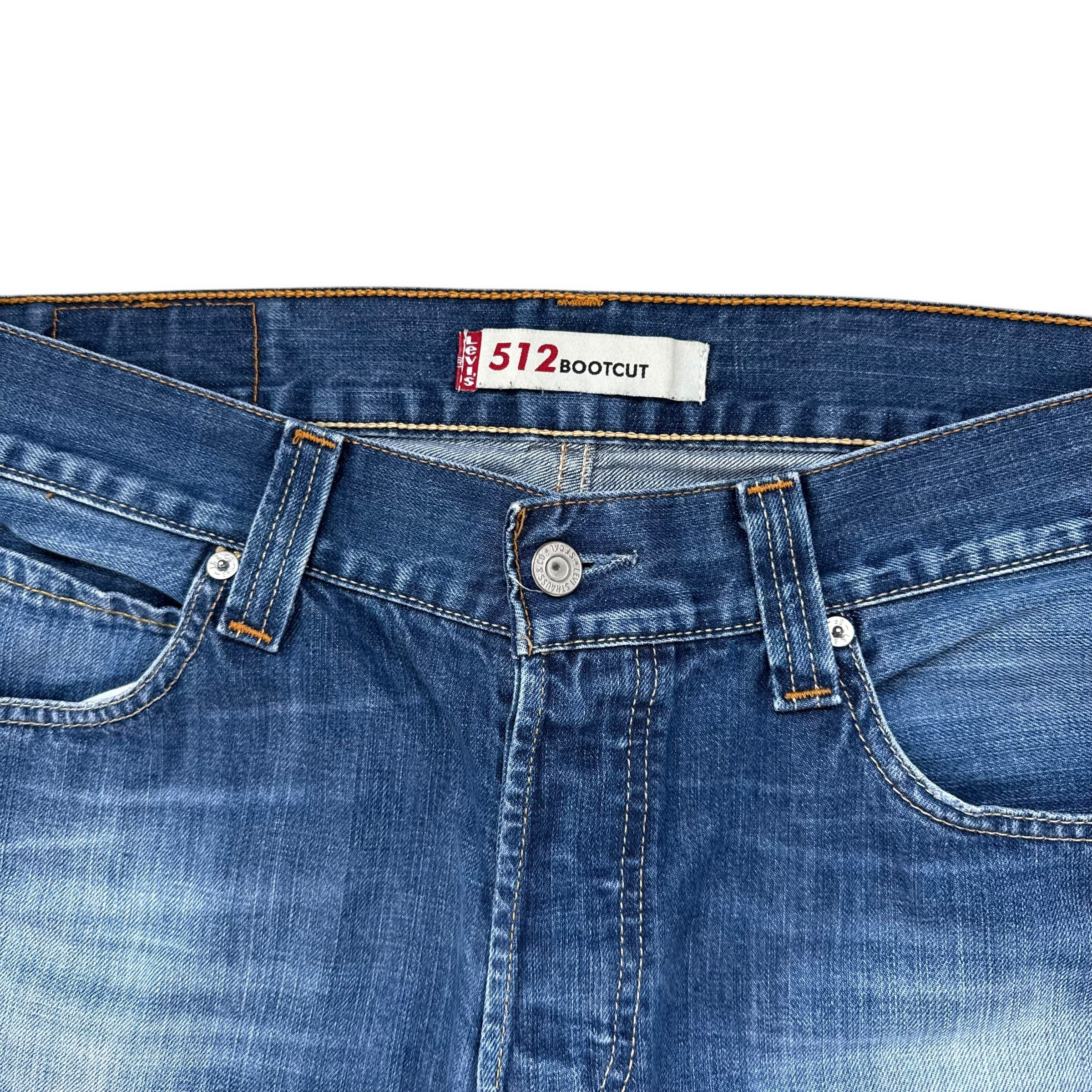 Levi's 512 2000's worn faded and washed denim bootcut jeans (S-M)