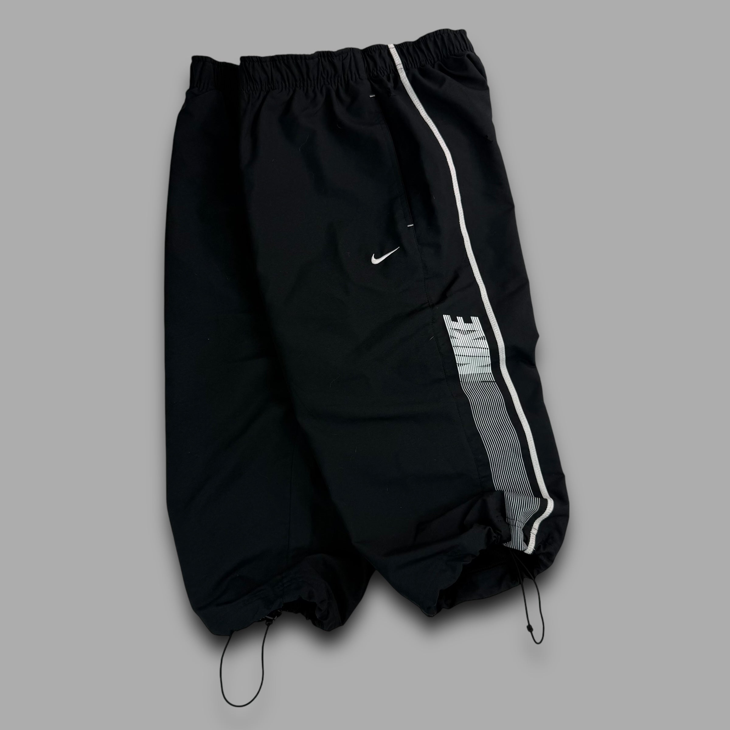 Nike 2000's baggy wide leg spellout shorts (M)