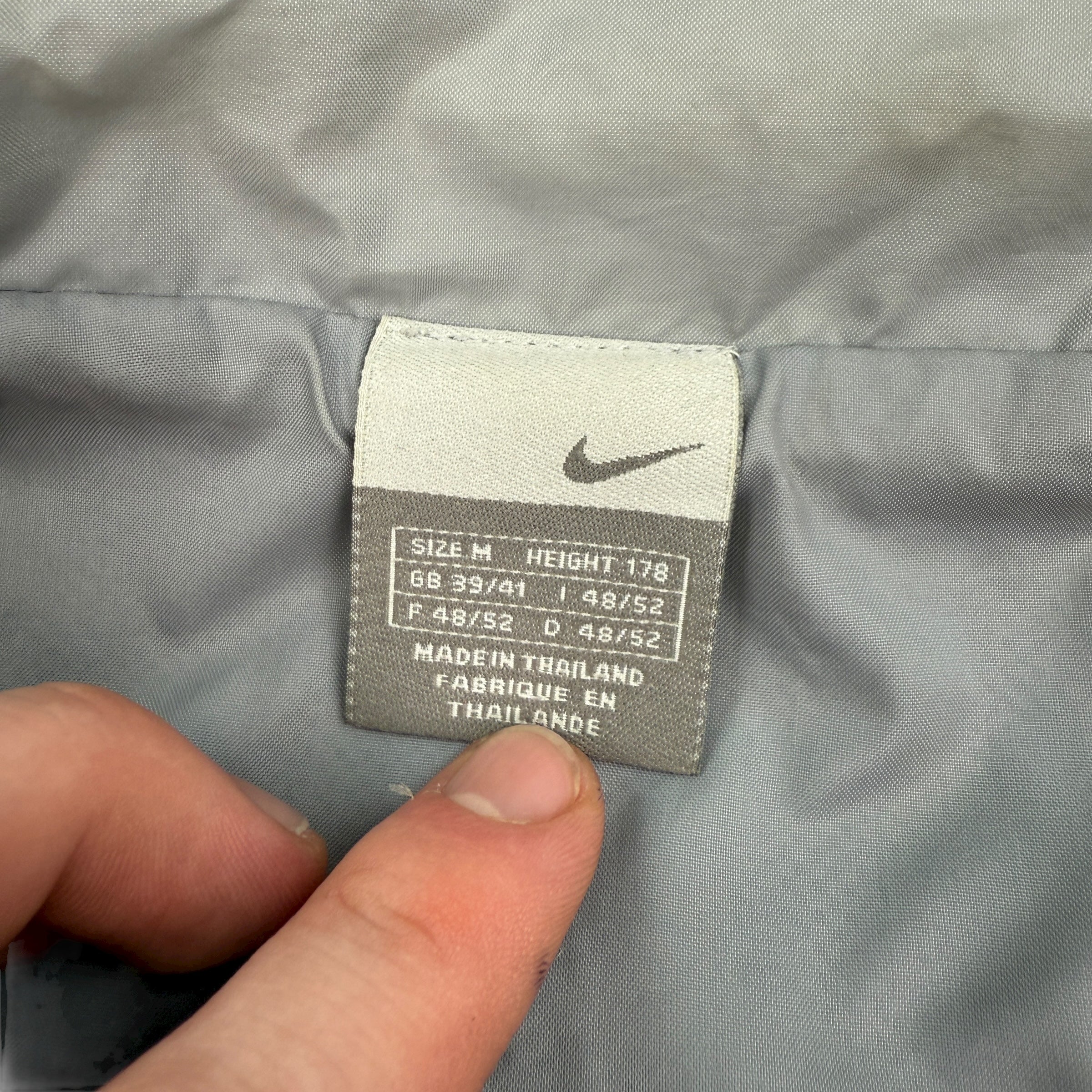 Nike 2000's technical panelled multi-pocket track jacket (M)