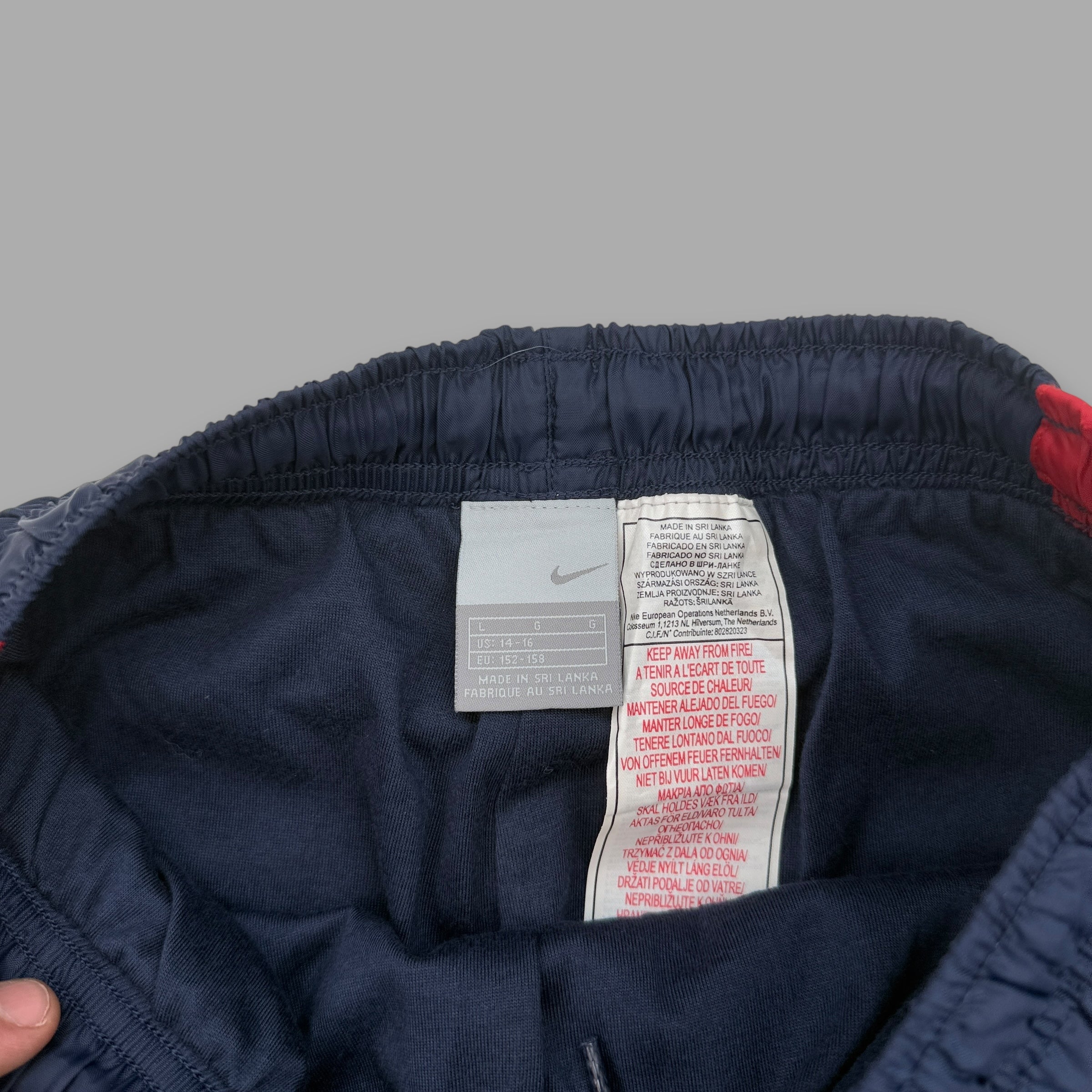 Nike 2000's baggy wide leg track bottoms (S)