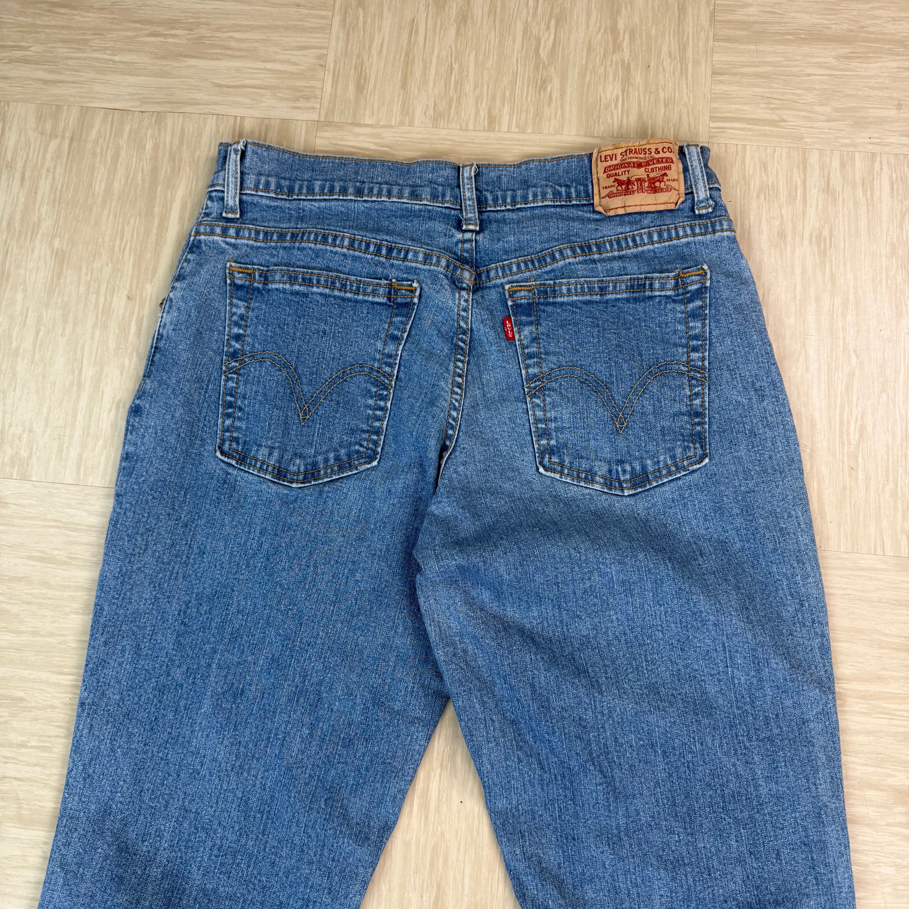 Levi's 550 2000's relaxed bootcut light washed denim jeans (S)