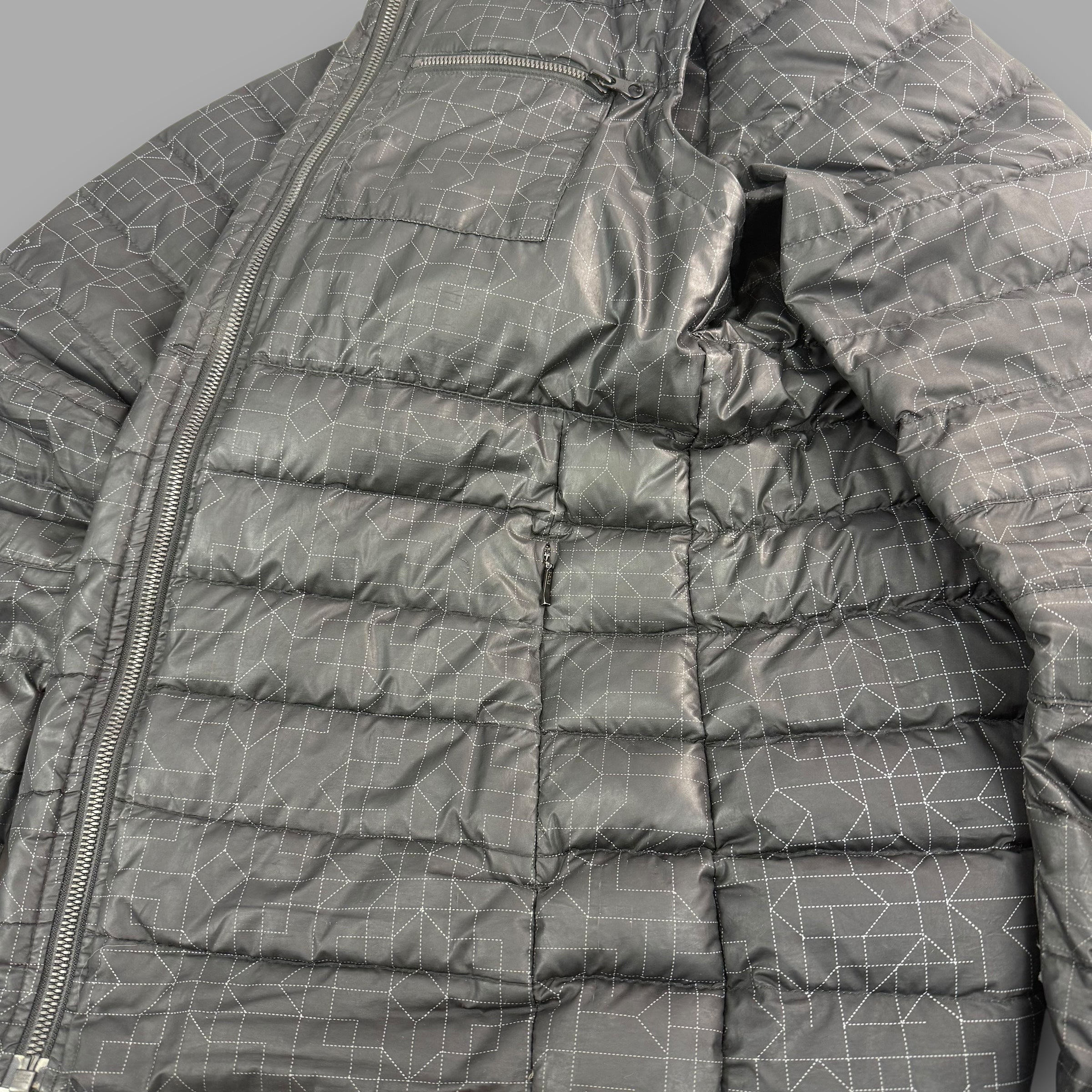 Nike 2000's technical articulated monogram puffer jacket (M)