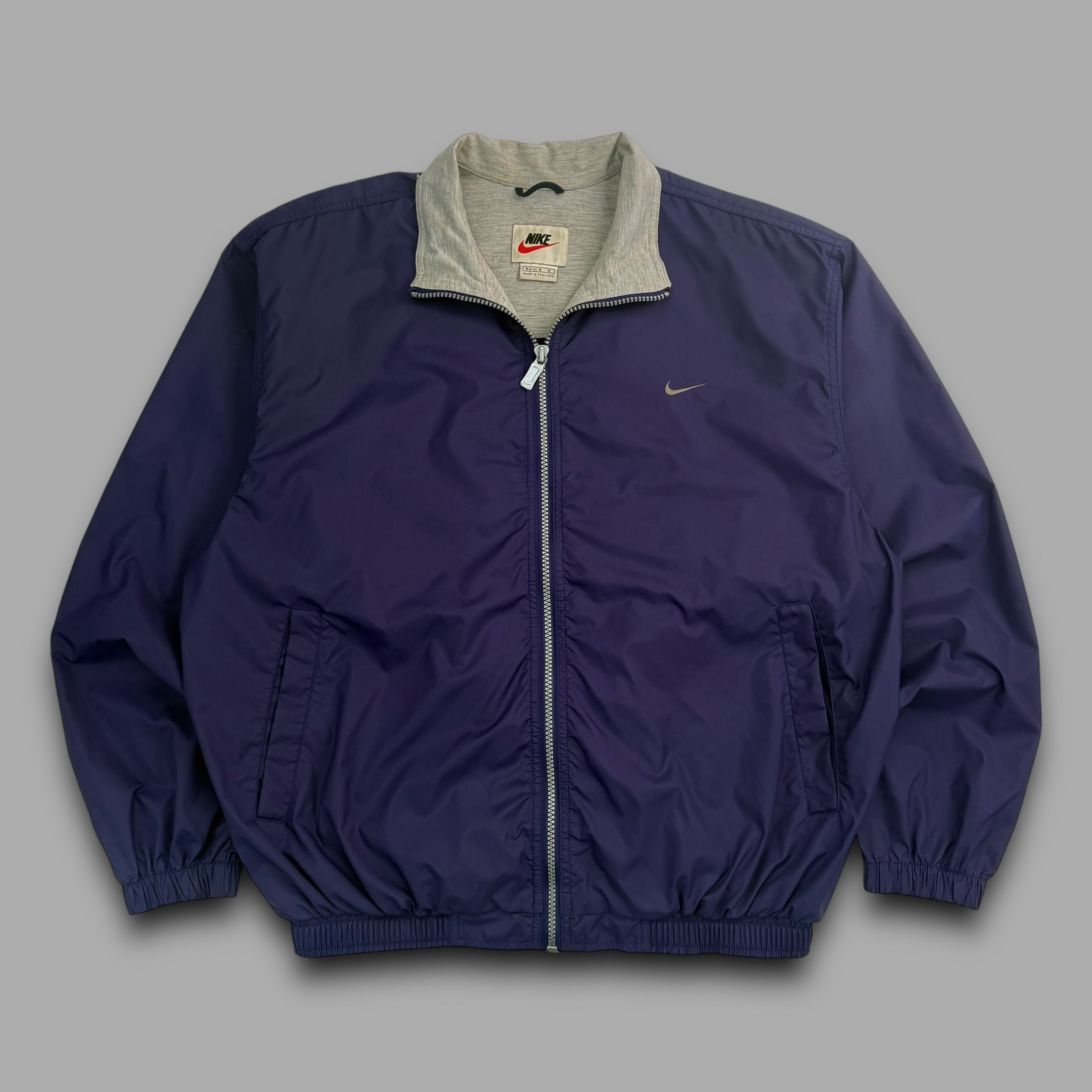 Nike 1990's packable full zip cropped nylon windbreaker (S)