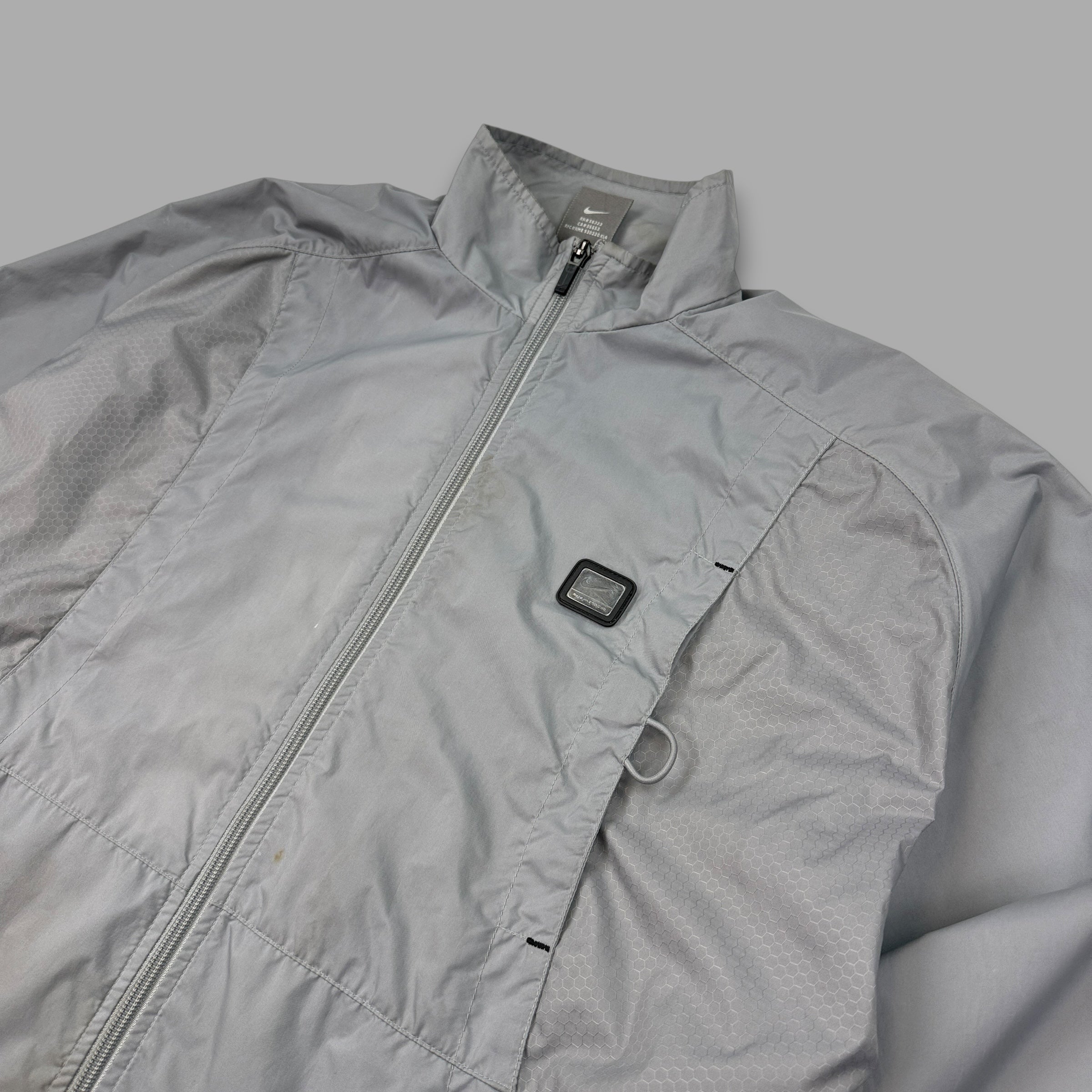 Nike 2000's technical panelled multi-pocket track jacket (M)