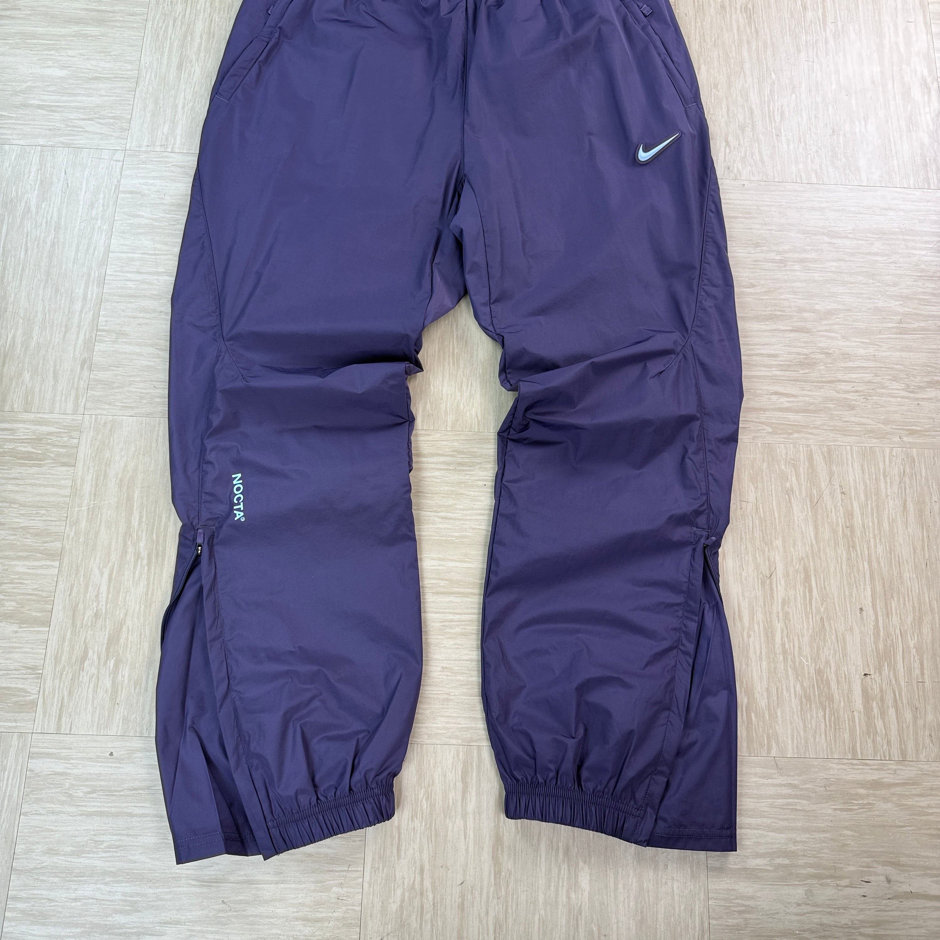 Nike x nocta North Star nylon track bottoms (M)