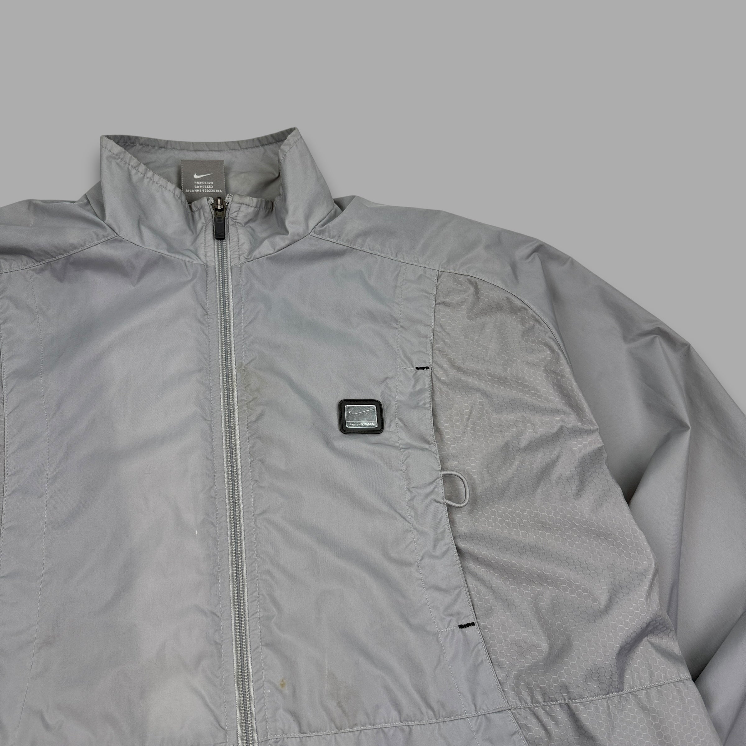 Nike 2000's technical panelled multi-pocket track jacket (M)