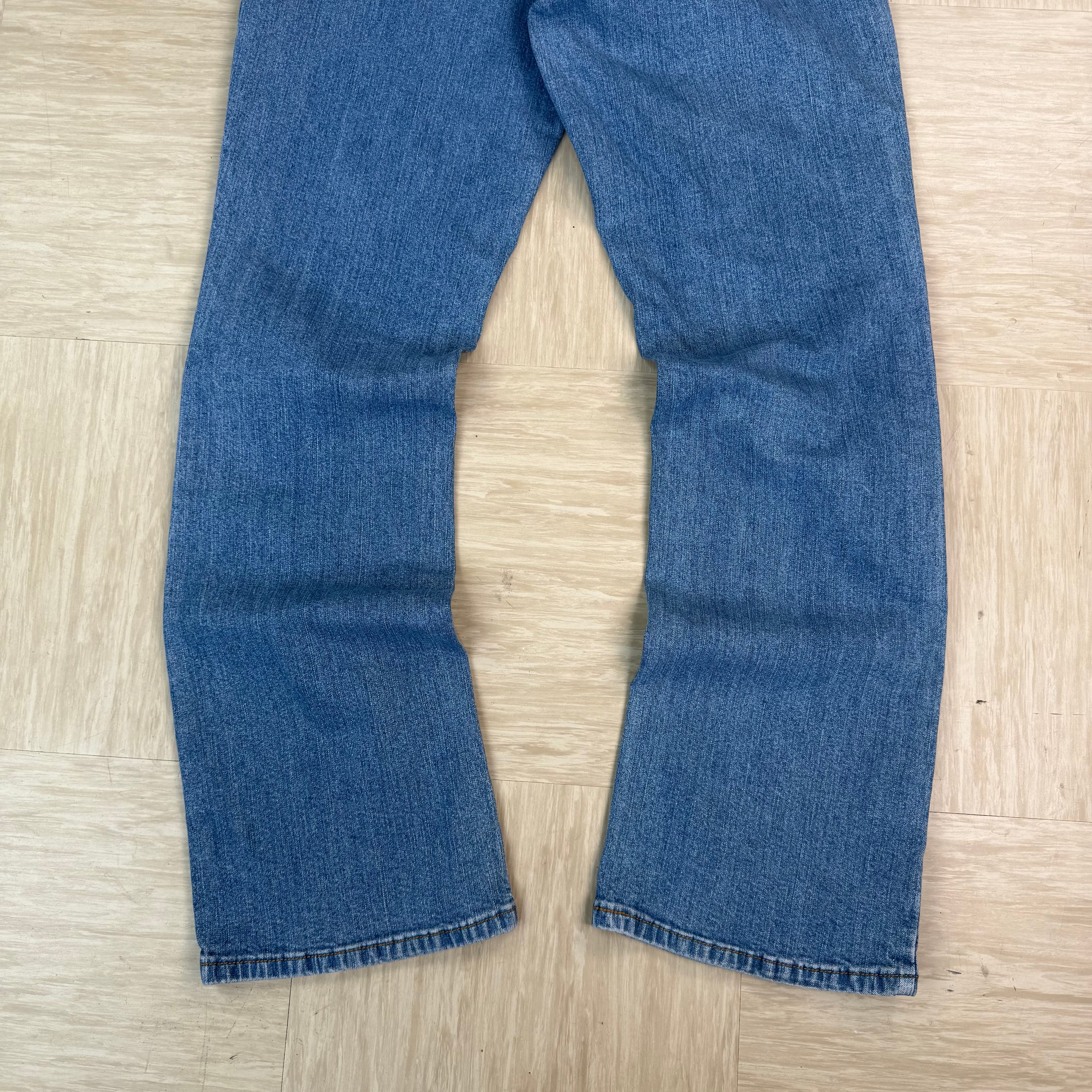 Levi's 550 2000's relaxed bootcut light washed denim jeans (S)