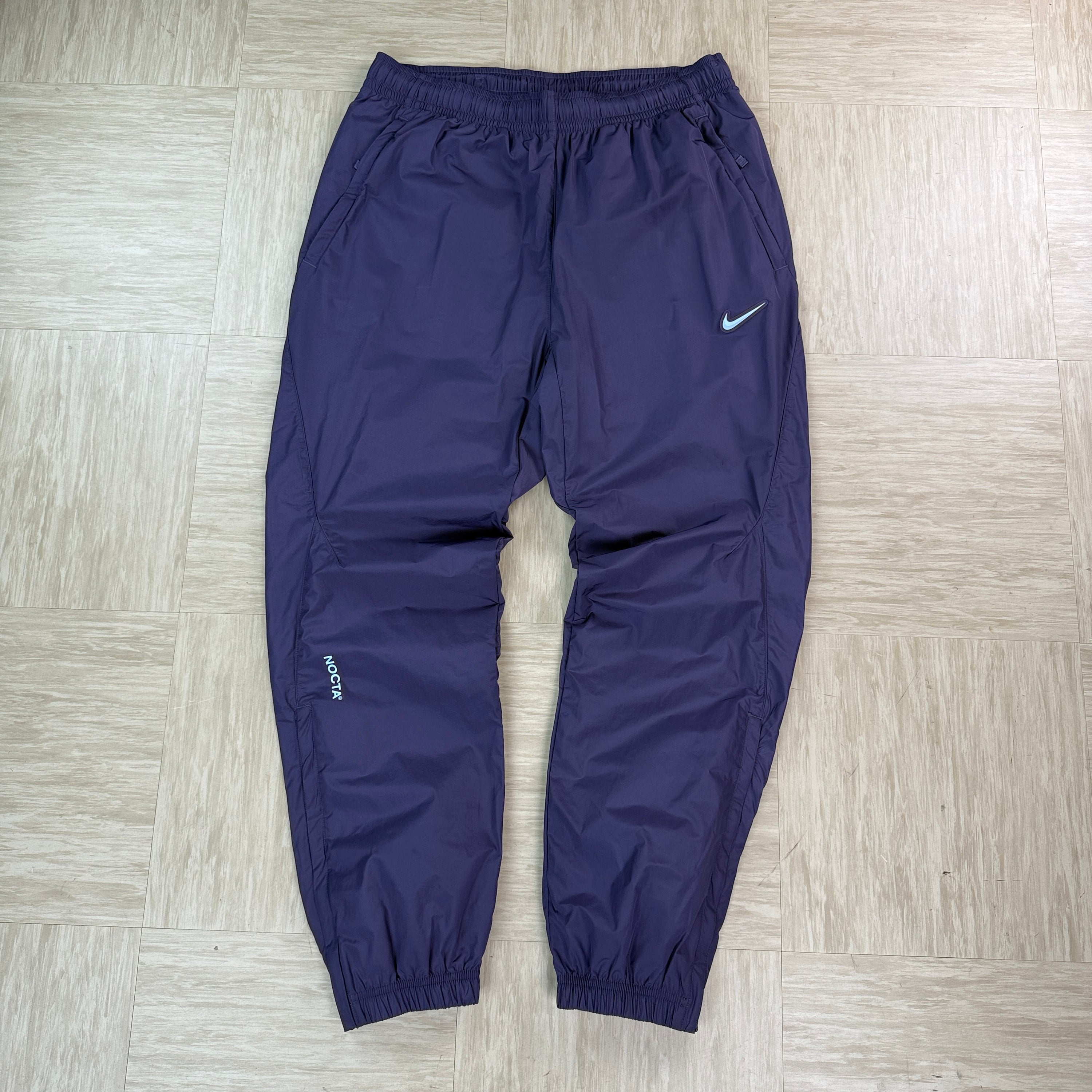 Nike x nocta North Star nylon track bottoms (M)