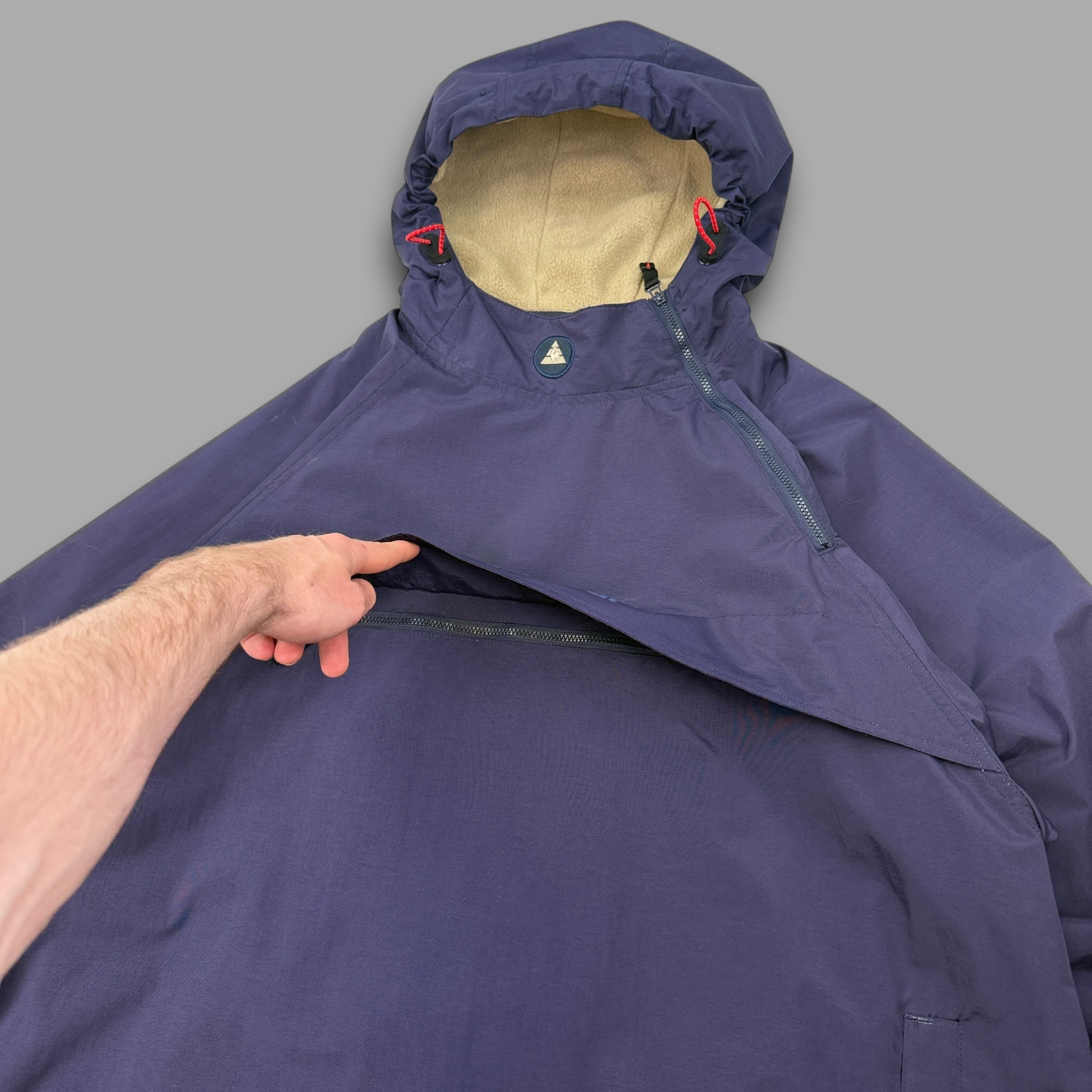 Le coq sportif 2000's technical asymmetrical zip pullover windbreaker (XL)