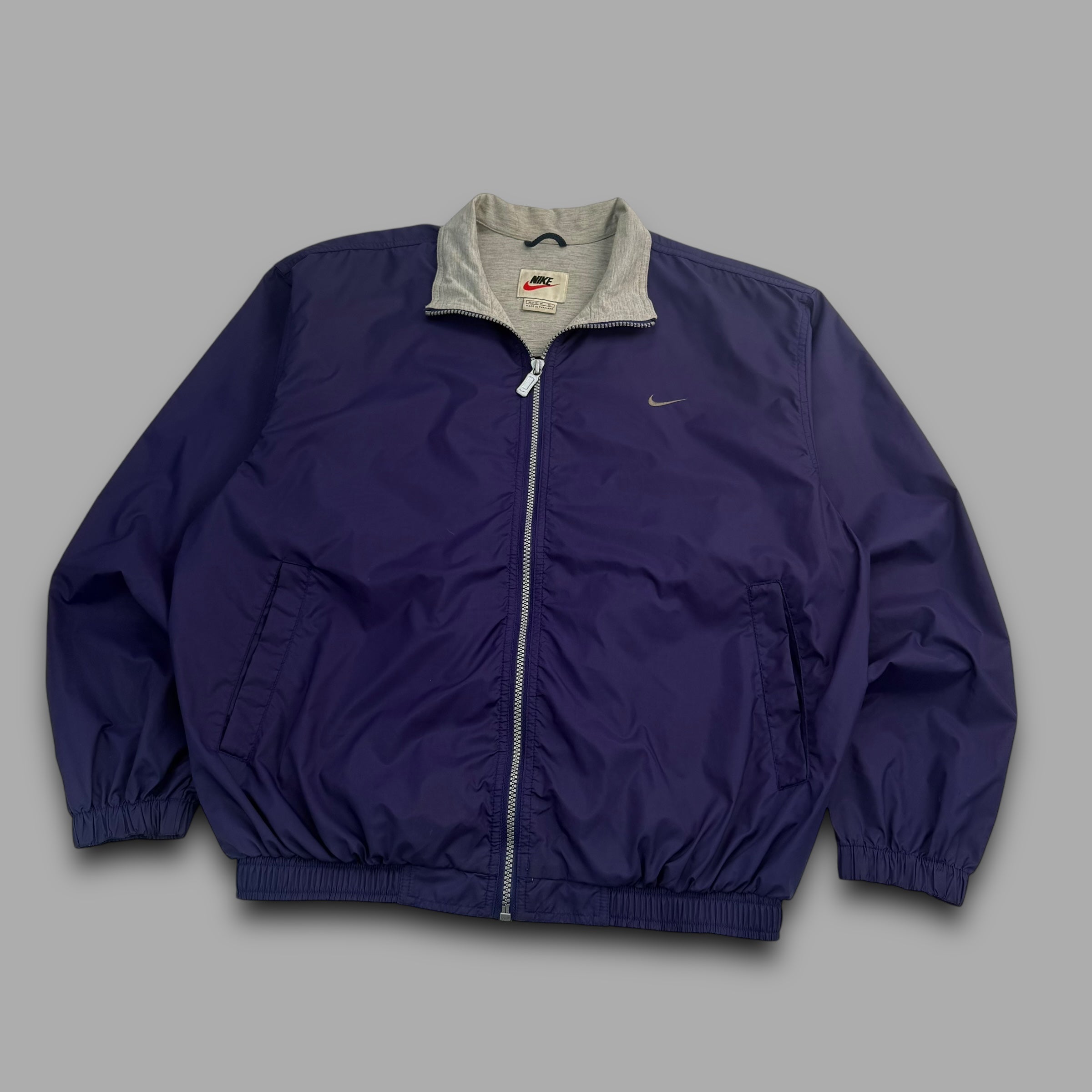 Nike 1990's packable full zip cropped nylon windbreaker (S)