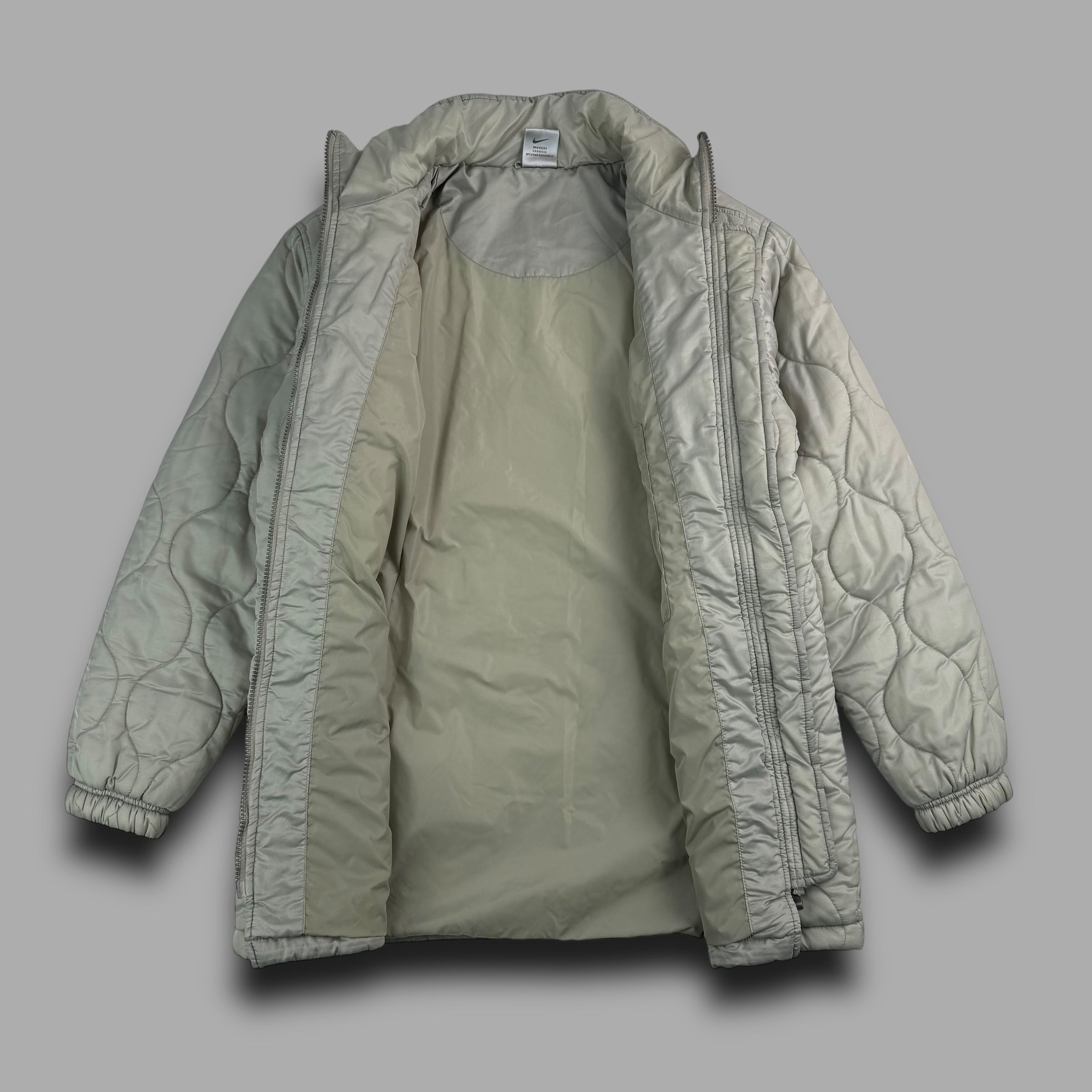 Nike 2000's mini swoosh patterned puffer jacket (S)