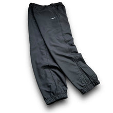 Load image into Gallery viewer, Nike 2000’s baggy cuffed track bottoms (L)
