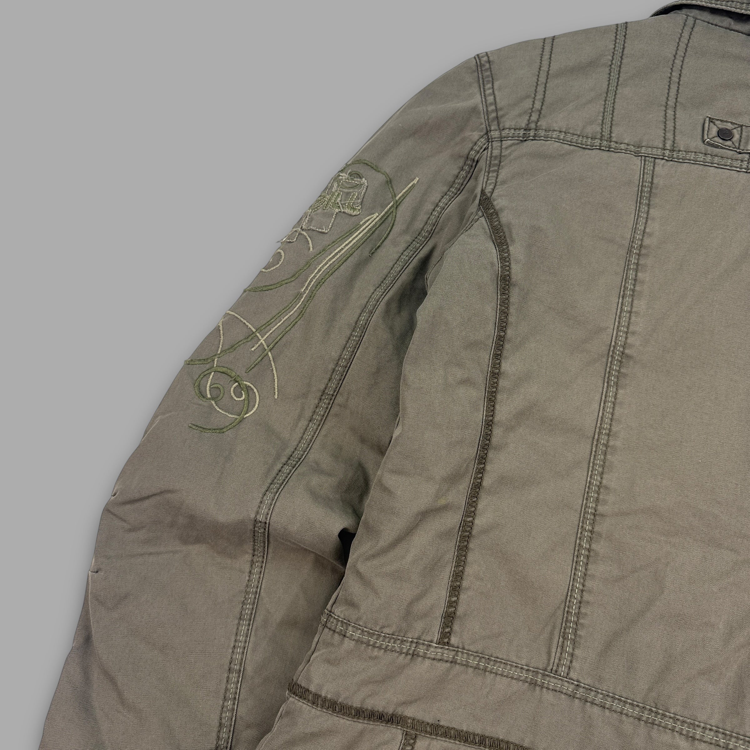 O'Neill 2000's multi-pocketed, pop button, embroidered utility jacket (L) wms