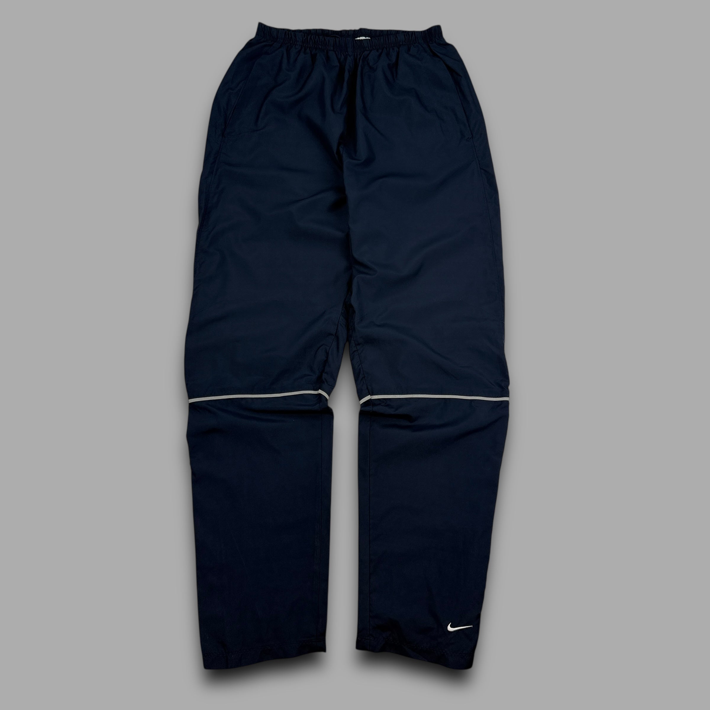 Nike 2000's baggy reflective nylon track bottoms (M)
