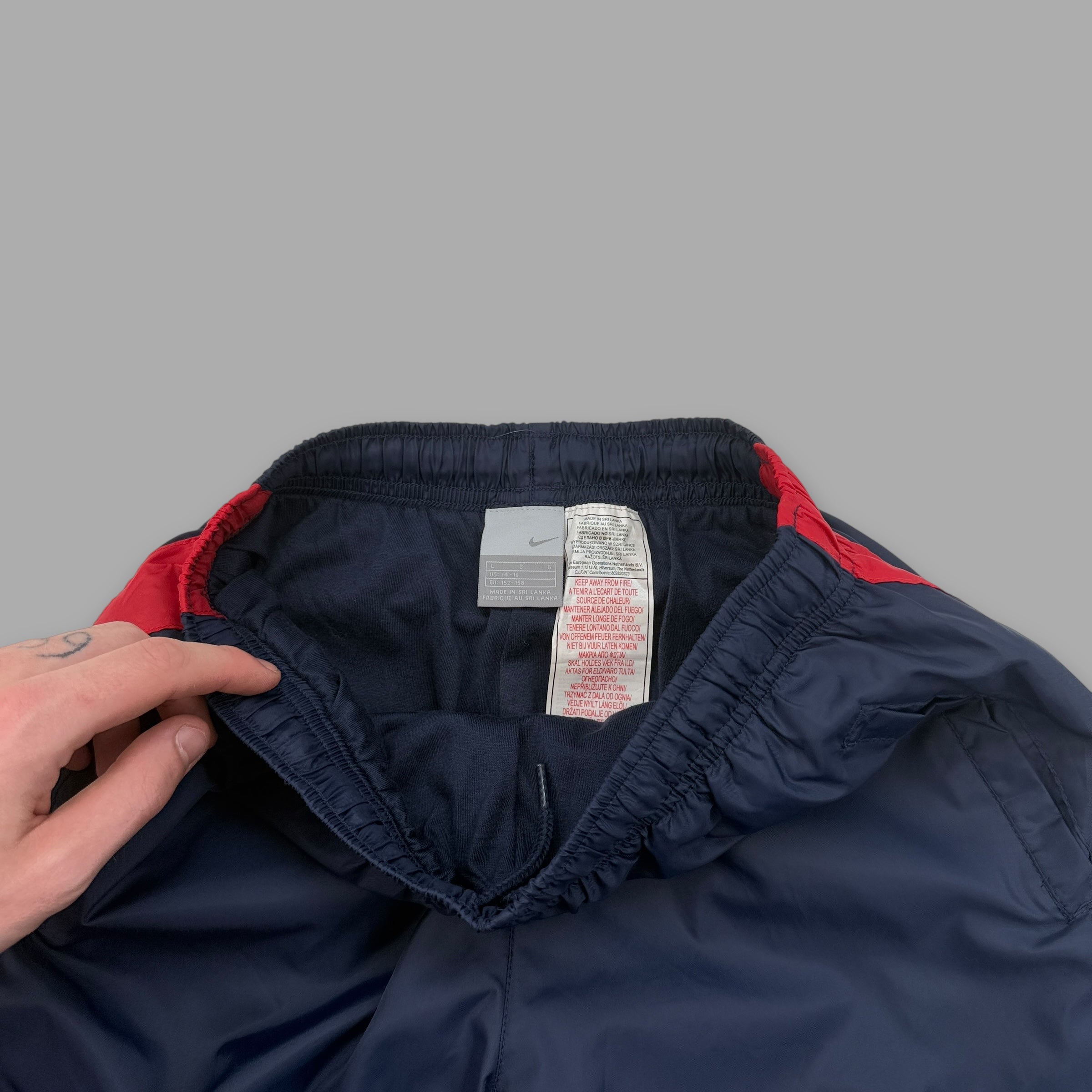 Nike 2000's baggy wide leg track bottoms (S)