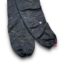 Load image into Gallery viewer, Nike TN laser 2000’s technical waterproof baggy track bottoms (M)
