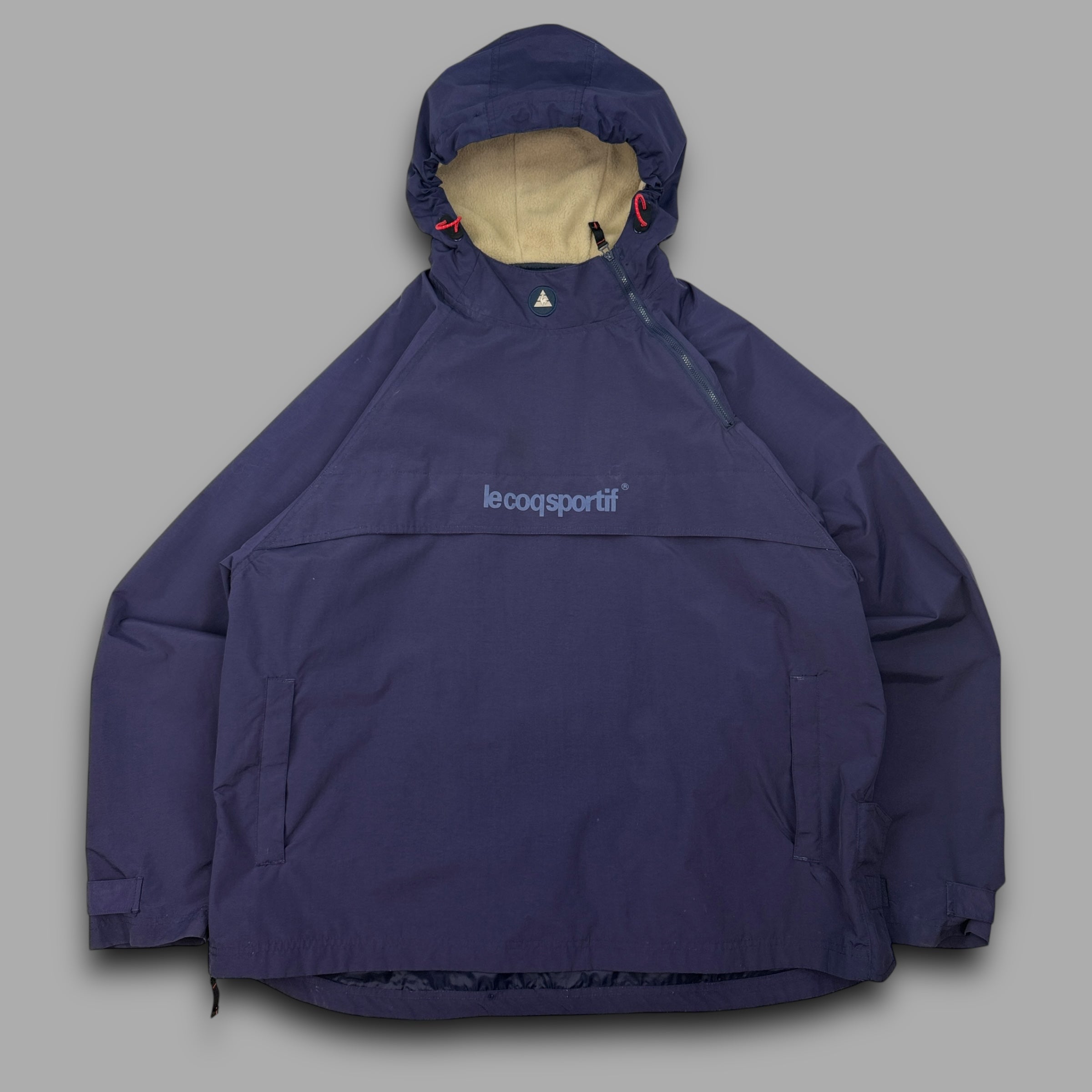 Le coq sportif 2000's technical asymmetrical zip pullover windbreaker (XL)