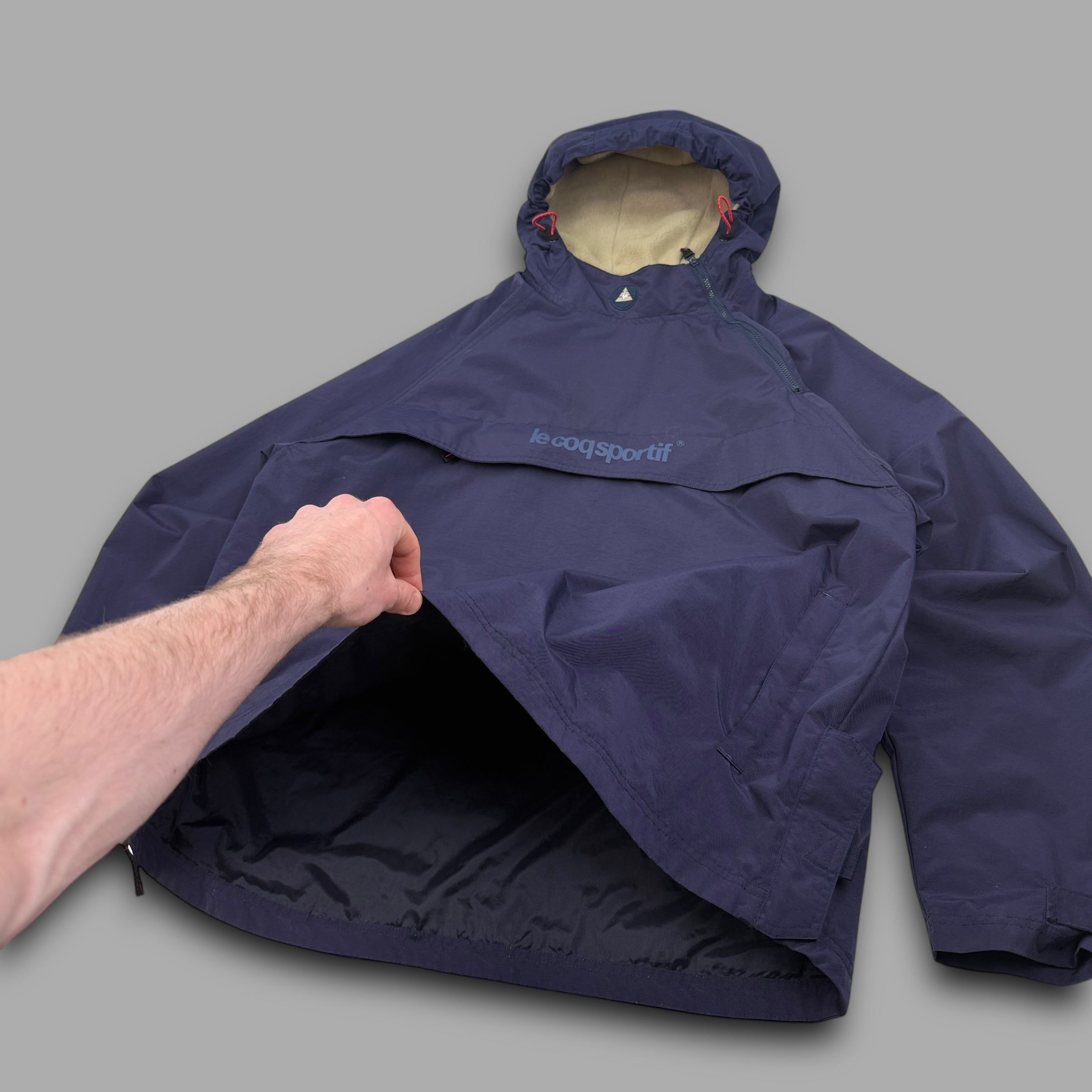 Le coq sportif 2000's technical asymmetrical zip pullover windbreaker (XL)