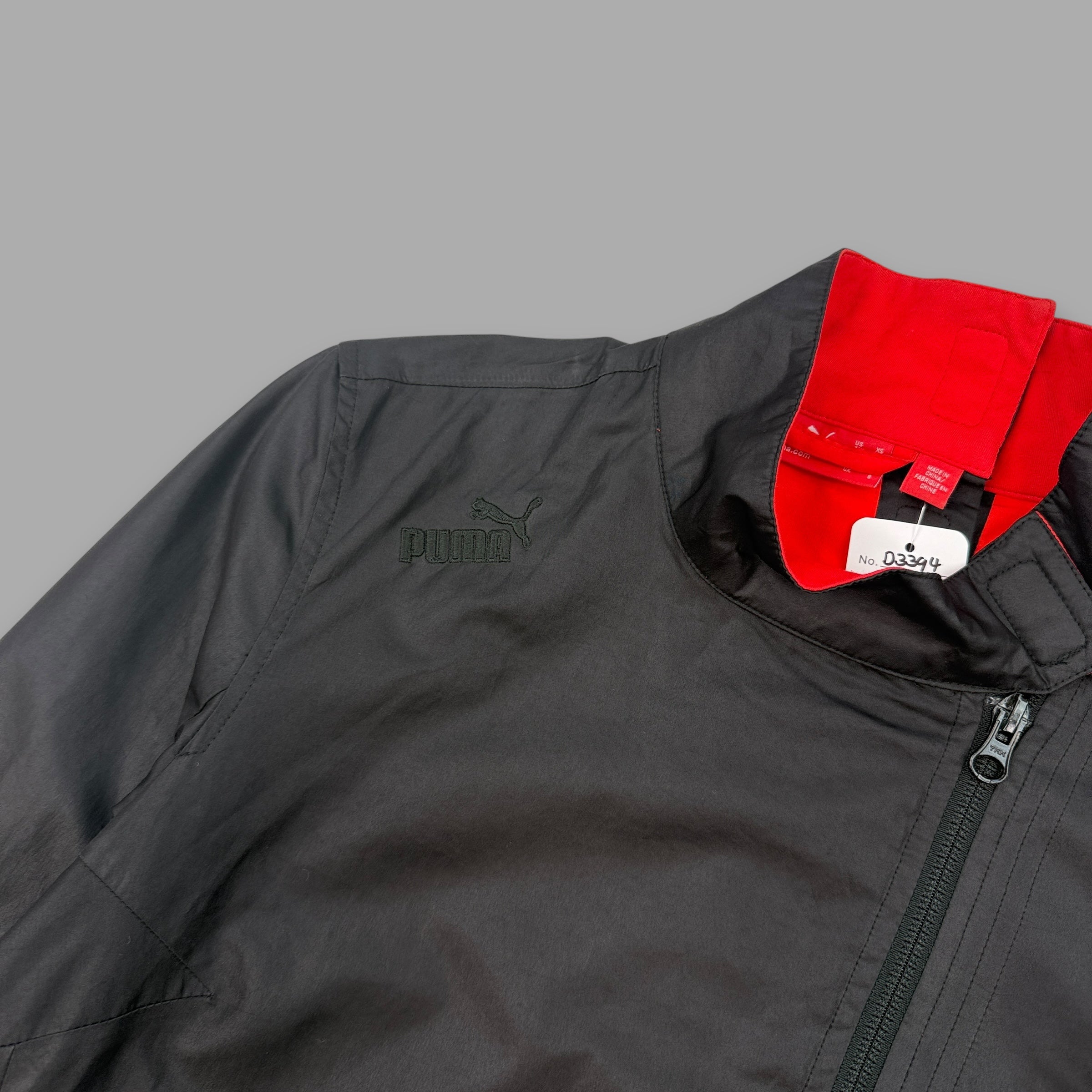 Puma 2000's technical asymmetrical zip track jacket (XS)