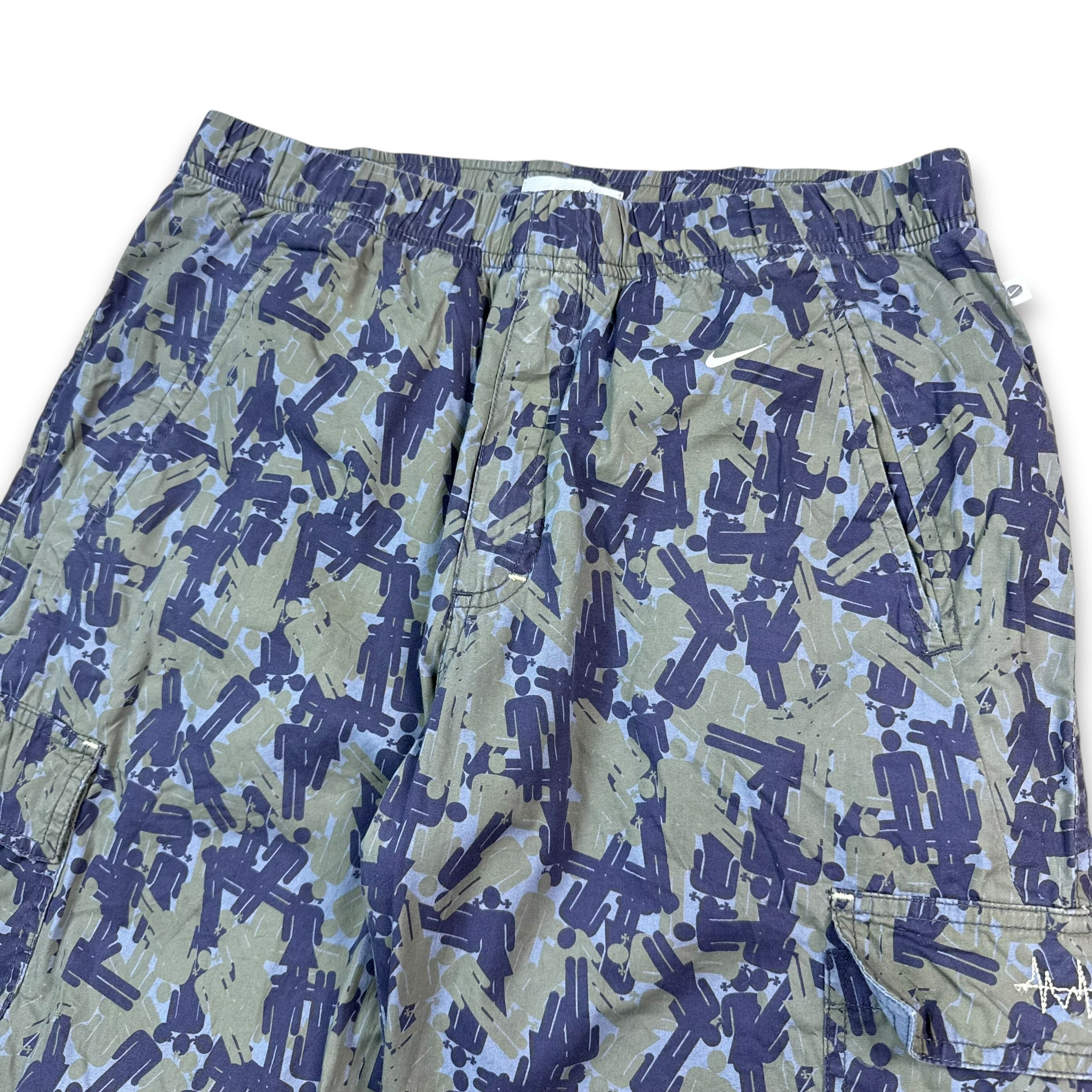 Nike 2000's graphic gender figure camo printed baggy bottoms (S)
