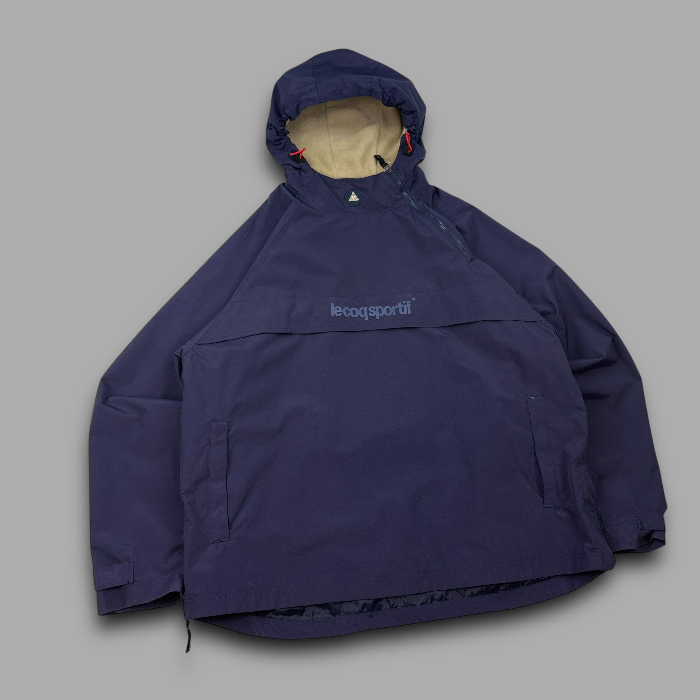 Le coq sportif 2000's technical asymmetrical zip pullover windbreaker (XL)