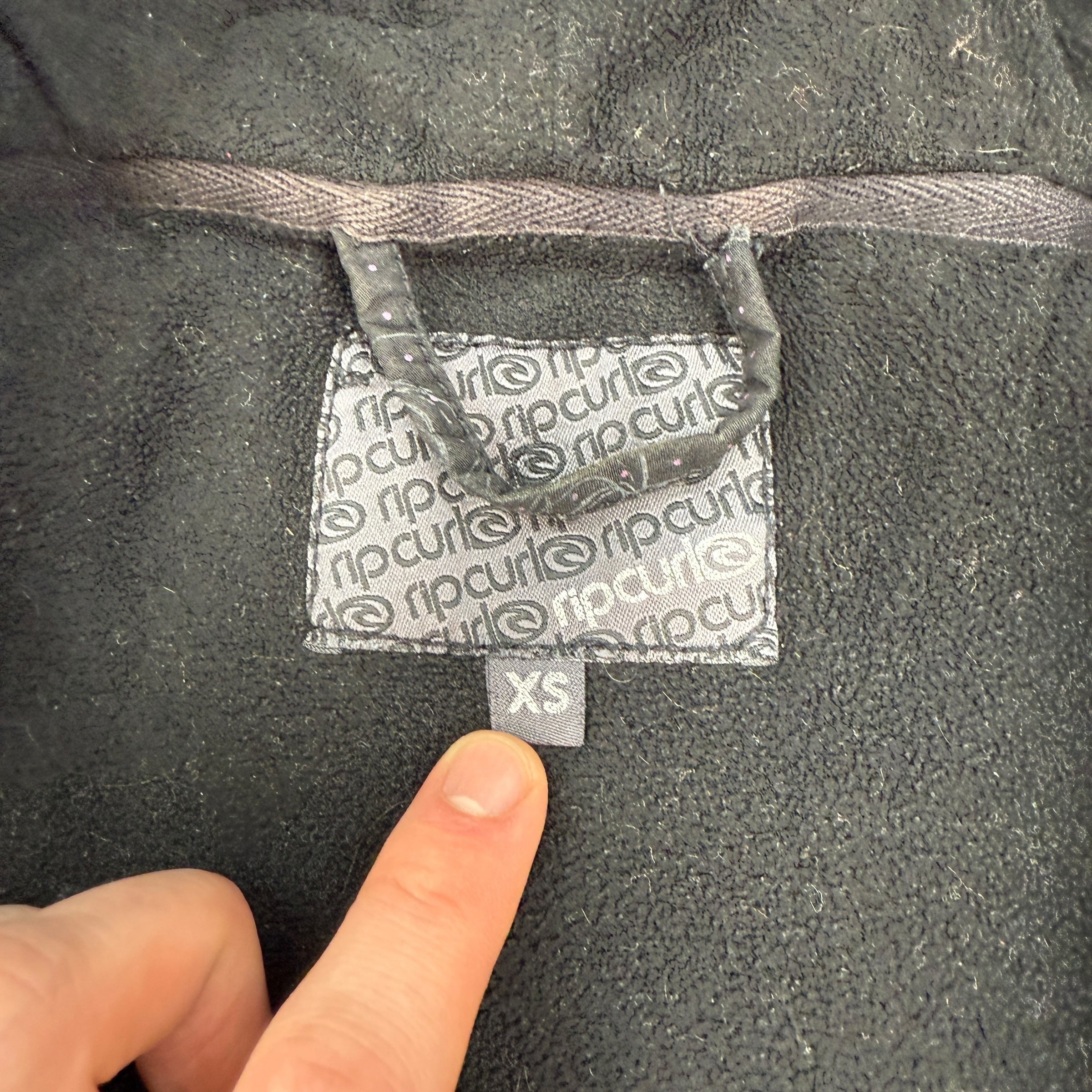 Ripcurl 2000's technical fleece lined, graphic pop button jacket (XS) wms