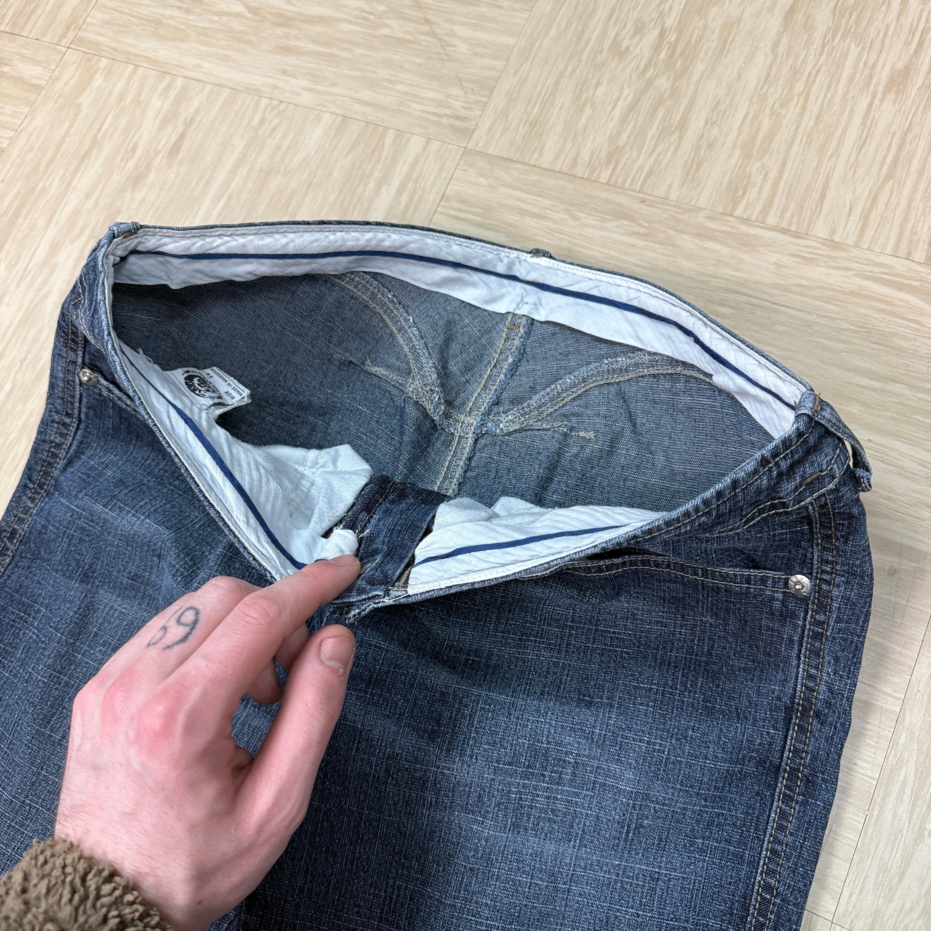 Diesel 2000's low waisted flared bootcut denim jeans (S-M)